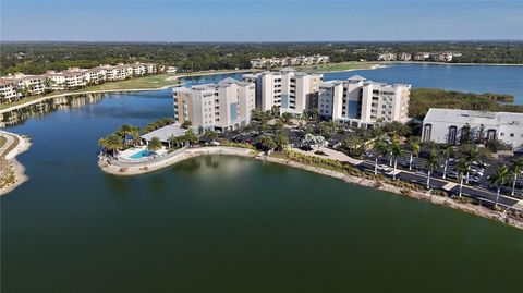 Photo of 10520 Boardwalk Loop #301, Bradenton, FL 34202 (MLS # A4674717)