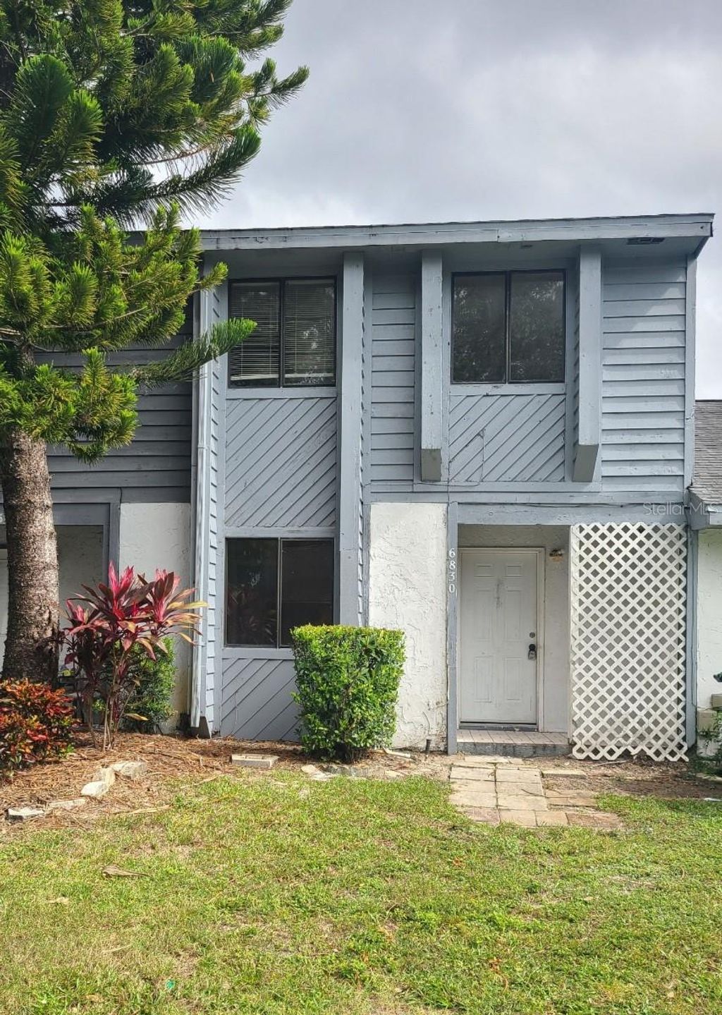 Photo of 6830 Magnolia Pointe Circle, Orlando, FL 32810 (MLS # O6364121)