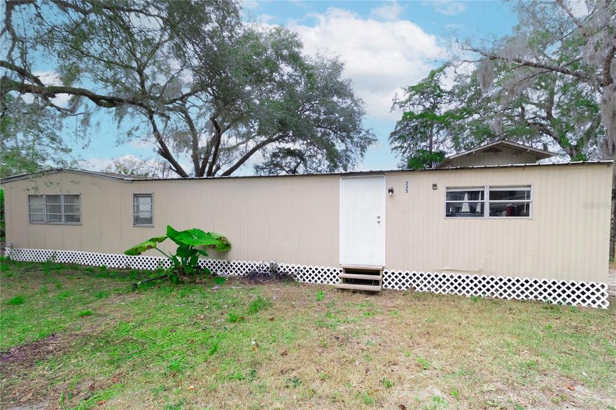 Lakefront versatility on peaceful Hart Lake with true east facing frontage and beautiful sunrise views. This unique property offers two separate residences on one parcel, providing exceptional flexibility for a variety of living or income opportunities.
The two-story Nest Cottage features a bright and light filled upstairs studio, while the separate two-bedroom, one-bathroom mobile home offers comfortable and functional living space. This setup is ideal for multigenerational living, owner occupancy with rental income, a guest or in law retreat, home office, or short-term rental use. Buyers may explore long term or vacation rental options subject to verification and local regulations.
Both interiors feel refreshed and welcoming, while the outdoor setting invites kayaking, fishing, and peaceful mornings by the water. The property includes an onsite well, ample parking, and convenient access to North County Road 315, Interlachen amenities, and nearby public boat ramps.
The property is tenant occupied, and advance notice is required for all showings. This is a rare opportunity to own a move in ready lakefront property with built in flexibility and the ability to personalize over time. Buyer to verify all measurements, zoning and permitted uses, lease terms and transferability, and eligibility for any dock or shoreline improvements. Some photos have been irtually staged to show potential layout and furnishings.  Owner is a licensed Realtor.