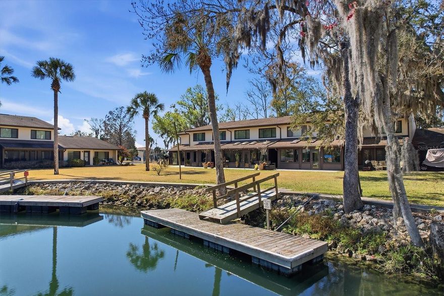 You have to come take a look at this beautifully renovated 3 bedroom 2 bath condo located in the heart of Crystal River! Included in the renovation you will find new appliances, flooring, paint and cabinets, just to name a few items. If you are into antiques, you will love the Egyptian doors going into the pantry. This condo also has a fully enclosed patio with new windows, skylight and is plumbed and ready for you to add an ice machine and mini split. The back patio has a great sitting area with travertine decking so that you can enjoy your water view. Centrally located, and close to downtown, this golf cart community is perfect for all your social needs as you will be walking distance to waterfront restaurants, festivals and all the city activities. And lets not forget boating, kayaking and paddle boarding to the beautiful crystal clear springs or the shallows. The HOA condo association covers many homeowners' needs to make it easy and stress free along with a community pool for owners to enjoy without the hassle of having to care for it themselves. Included with the HOA are flood insurance, lawn maintenance, building maintenance, the roof (which was just replaced in 2026), dock spaces, and much more! Crystal River has so much to offer and this condo is move in ready!