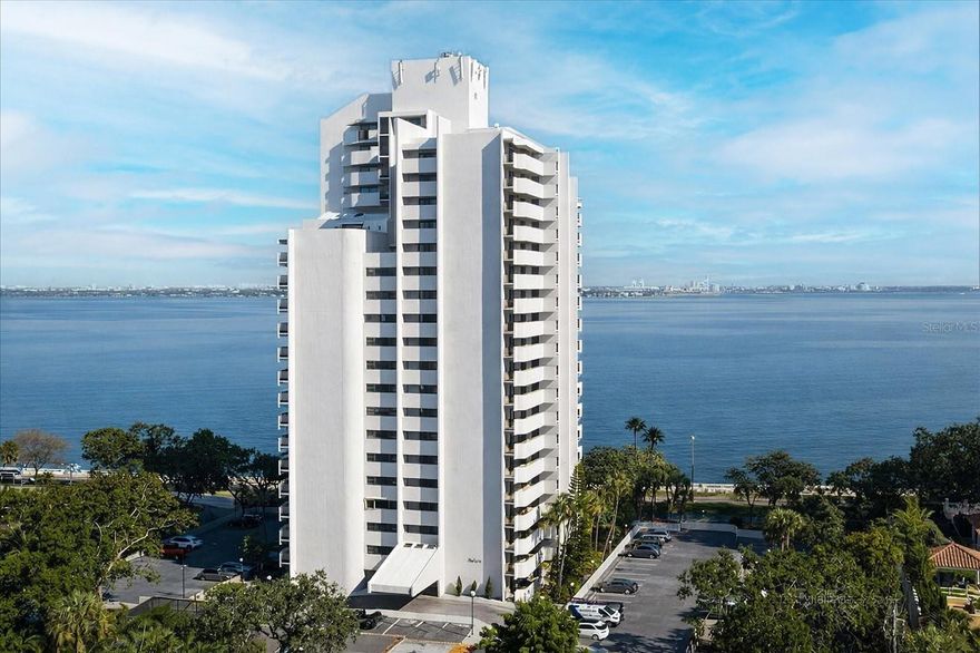Penthouse living on iconic Bayshore Boulevard with breathtaking panoramic views of Tampa Bay and the downtown skyline. This fully renovated 2-bedroom, 3-bath residence offers rare east, north, and west exposures, allowing you to enjoy both sunrise and sunset from three private balconies.

Thoughtfully redesigned in 2017, the home features a warm coastal aesthetic with high-end finishes throughout, including quartz countertops, an Italian marble backsplash, and premium appliances. The kitchen is both stylish and functional, perfect for everyday living and entertaining. Flooring was updated in 2023, and the A/C was replaced in 2021.

A versatile bonus room provides the ideal space for a home office, studio, or potential third bedroom conversion. The penthouse location offers enhanced privacy and security with private elevator access.

Residents enjoy a full-service lifestyle with resort-style amenities, including a waterfront pool, fitness center with sauna, community room, guest suites, on-site management, and security. The unit also includes three assigned parking spaces two in the garage and one outdoor an exceptional offering along Bayshore.

Located directly on Bayshore Boulevard, enjoy miles of scenic waterfront walking and biking paths just outside your door.