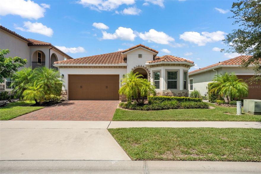 Look no further than this move-in ready home located in the highly desirable gated community of Eagle Creek. Known for its amazing golf course and zoned for top-rated schools, this home is sure to check off all the boxes and more! The paved driveway, brick elevation, and tile roof draw you in with the perfect curb appeal. The double entry doors welcome you inside, leading you to the first guest bedroom up front with 3 charming windows drawing in the natural light with a full bathroom out in the hallway. The home opens into the formal living room and dining room with the laundry room around the corner. The split floor plan features the 2 remaining guest bedrooms and a full bathroom down the hallway. Tucked up at the back of the home is the open concept kitchen and living room. Stainless steel appliances, granite countertops, dark cabinetry, and a large middle prep island are featured in the kitchen providing the perfect space for the chef in the family. The primary bedroom is located off the kitchen and offers a tray ceiling, walk in closet, and large ensuite with a double sink vanity, soaking tub, and stand-alone shower! Eagle Creek community offers a fitness center, golf course, clubhouse with restaurant, pool, playground, recreation center, basketball courts, tennis courts, and dog park. This location provides easy access to Lake Nona Medical City, Orlando Int'l airport, and SR 417. Schedule your private showing today!