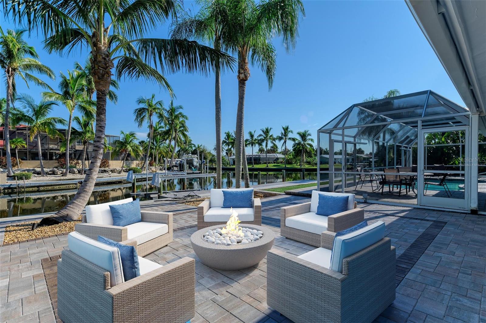One or more photo(s) has been virtually staged. WATERFRONT + ONE BLOCK TO SIESTA KEY BEACH! Location, location, location—don’t miss this chance to own a stunning canal-front home with 100 feet of frontage, just a block from the world-famous Siesta Key Beach!
This property features impressive upgrades:
- New Seawall and Dock
- New Roof (Nov. 2022)
- Hurricane-Impact Rated Windows, Sliders, Doors, and Garage Door (2023)
- New Circular Driveway with Lighting
- Paver Paths and Rear Patios
- Newly Resurfaced Pool
- Fresh Exterior Paint and Epoxied Garage Floor
- All New Irrigation Lines and Landscape Lighting
This meticulously updated 3-bedroom, 2-bath charmer offers captivating coastal appeal. Perfect for enjoying water activities, the coastal lifestyle, or simply relaxing in a serene setting.
Seize the opportunity to own this beautiful waterfront property on Siesta Key!