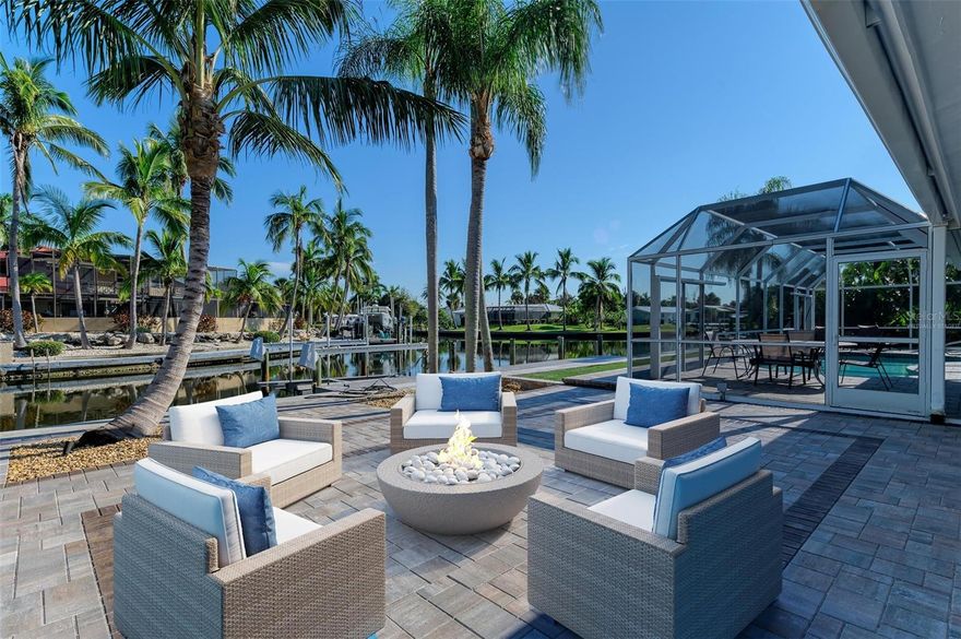 One or more photo(s) has been virtually staged. WATERFRONT + ONE BLOCK TO SIESTA KEY BEACH! Location, location, location—don’t miss this chance to own a stunning canal-front home with 100 feet of frontage, just a block from the world-famous Siesta Key Beach!

This property features impressive upgrades:

- New Seawall and Dock
- New Roof (Nov. 2022)
- Hurricane-Impact Rated Windows, Sliders, Doors, and Garage Door (2023)
- New Circular Driveway with Lighting
- Paver Paths and Rear Patios
- Newly Resurfaced Pool
- Fresh Exterior Paint and Epoxied Garage Floor
- All New Irrigation Lines and Landscape Lighting

This meticulously updated 3-bedroom, 2-bath charmer offers captivating coastal appeal. Perfect for enjoying water activities, the coastal lifestyle, or simply relaxing in a serene setting.

Seize the opportunity to own this beautiful waterfront property on Siesta Key!