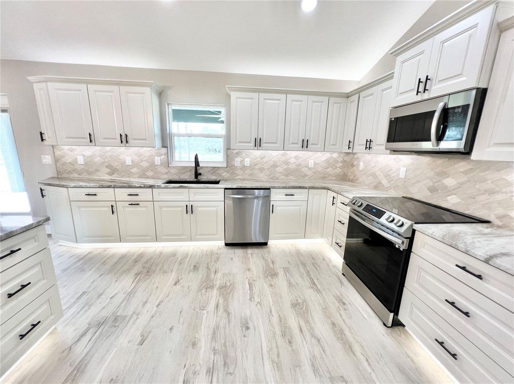 Photo of 6425 SW 180th Circle, Dunnellon, FL 34432 (MLS # O6355591)