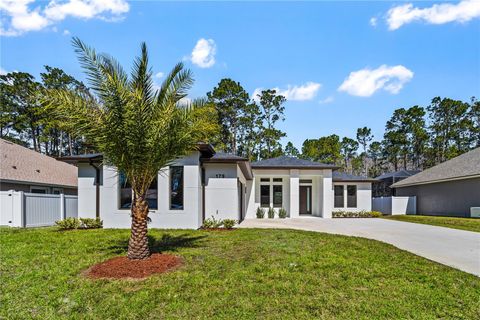 Photo of 179 Eric Drive, Palm Coast, FL 32164 (MLS # FC311044)
