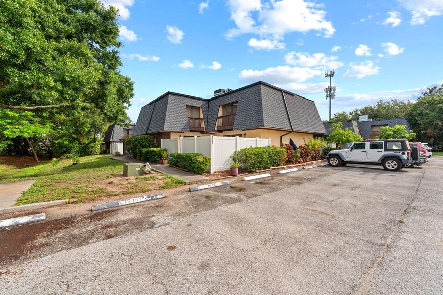 Fully remodeled and beautifully updated, this 2-bedroom, 2-bathroom townhome is nestled in the quiet community of Oak Trace in the heart of Tampa's Town 'n' Country. Step inside to a bright, open layout with new luxury vinyl plank flooring, fresh paint, and modern lighting throughout. The reimagined kitchen is the centerpiece of the home, featuring custom shaker cabinetry with gold hardware, stunning quartz countertops, a breakfast bar island, and a full suite of brand-new stainless steel appliances. Sliding glass doors open to your own private fenced patio, perfect for relaxing or entertaining. Both spacious bedrooms are upstairs with their own private balconies and generous closet space, served by a fully updated full bathroom on the same floor. A second full bathroom is conveniently located on the main level. From the brand-new roof and gutters down to the last finish, this home has been fully renovated throughout — nothing left to do but move in. Conveniently located minutes from Tampa International Airport, the Veterans Expressway, and everyday shopping and dining. Move-in ready!