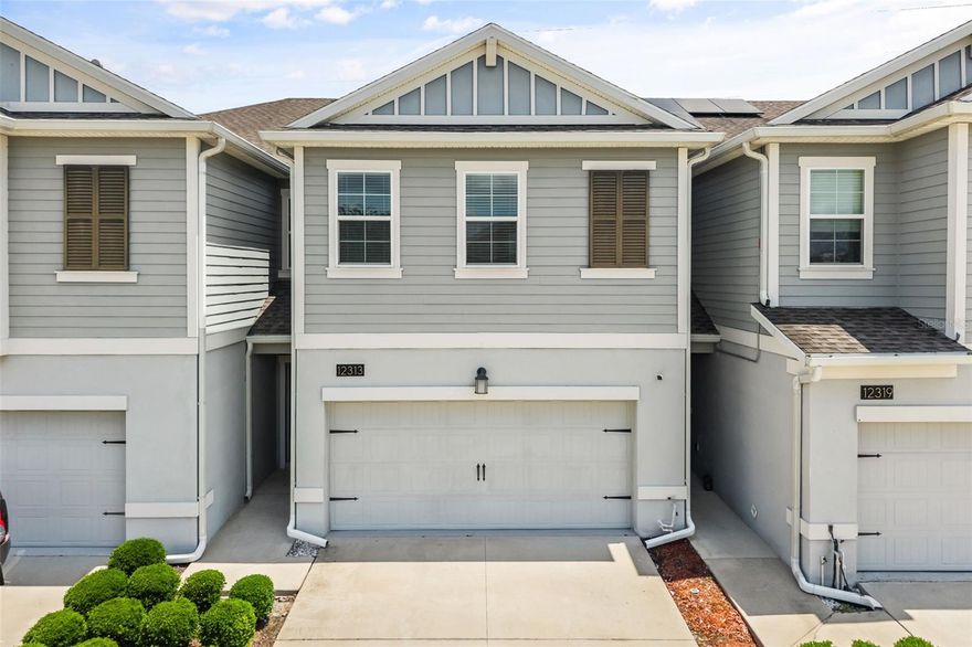 Welcome to 12313 Turtle Grass Drive in the highly desirable Sawgrass Plantation community of Orlando. This beautifully maintained 3-bedroom, 2.5-bath townhome offers 1,741 square feet of thoughtfully designed living space built in 2018. Featuring an open-concept floor plan, spacious living and dining areas, and a modern kitchen with quartz countertops, 42” cabinetry, and stainless steel appliances, this home is move-in ready.

Recent upgrades include fresh interior paint and a water softener system in the kitchen, adding comfort and value for the next owner. Upstairs, the oversized primary suite includes a walk-in closet and private bath, while two additional bedrooms provide flexibility for guests, family, or a home office.

Enjoy a 2-car garage, no rear neighbors, and access to community amenities including a pool, playground, and walking areas. Conveniently located near Lake Nona Medical City, Orlando International Airport, major highways, shopping, and dining.