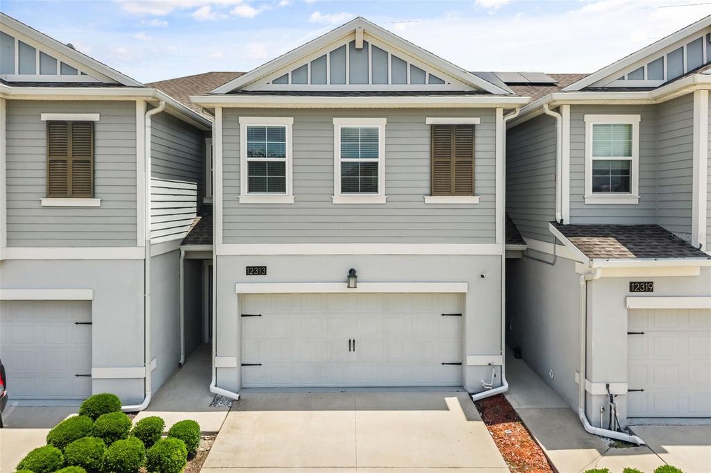 Photo of 12313 Turtle Grass Drive, Orlando, FL 32824 (MLS # O6408046)