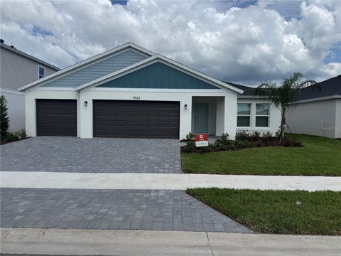 Photo of 9924 Annunciation Dr, Wesley Chapel, FL 33545 (MLS # J1004432)