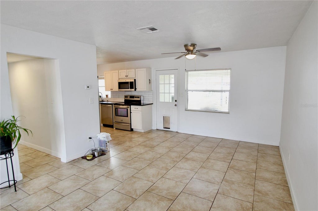 Photo of 55 Randia Drive, Orlando, FL 32807 (MLS # O6416370)
