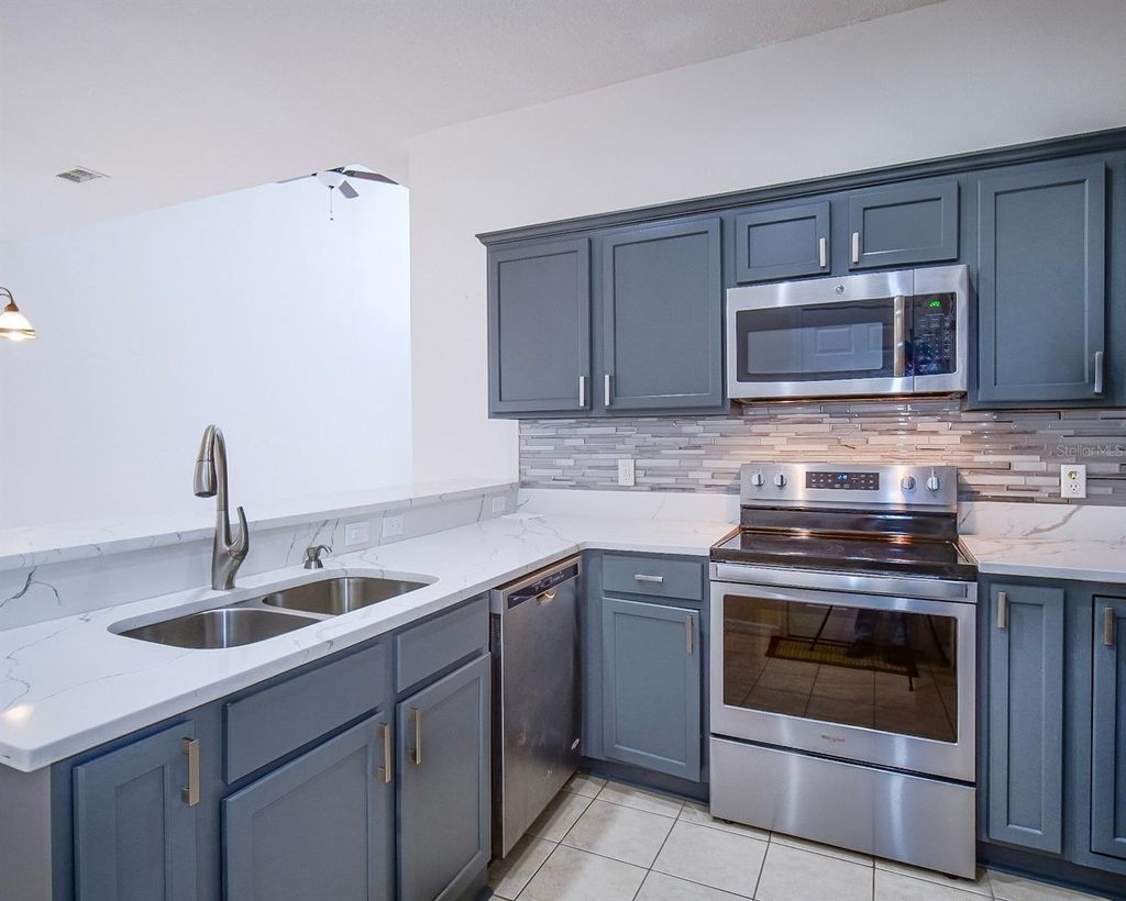 Photo of 10033 Moorshire Circle, Orlando, FL 32829 (MLS # O6397224)