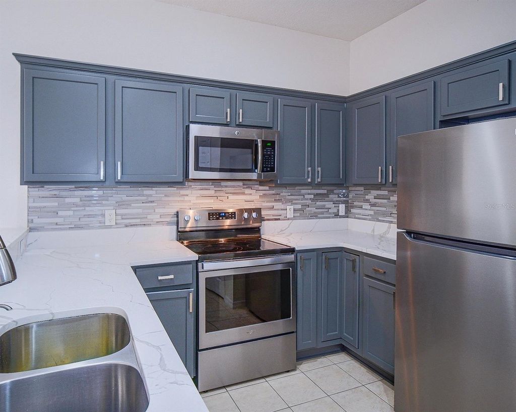 Photo of 10033 Moorshire Circle, Orlando, FL 32829 (MLS # O6397224)