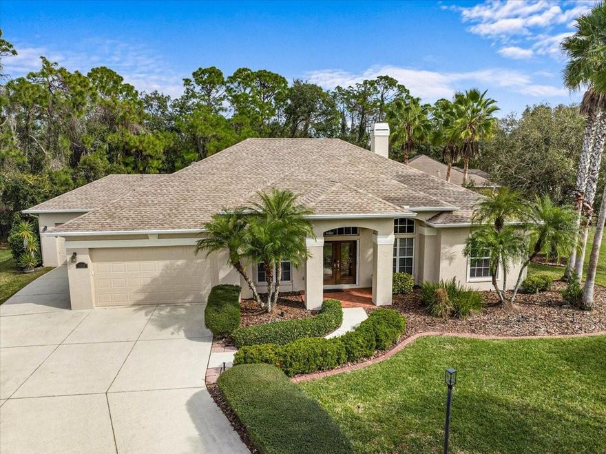 Located on a quiet cul-de-sac in Mill Creek, this beautifully maintained 4/3/den/3-car garage pool home offers space, privacy, and a thoughtful layout on an oversized 0.54-acre lot.  The home has a BRAND NEW ROOF and is positioned back on the lot creating amazing curb appeal and plenty of parking for guests.  The elegantly etched double front doors lead inside to hardwood flooring that flows through the living area. The focal point of the family room is a lovely wood-burning fireplace and sliding glass doors that frame the views of the picturesque backyard.  The kitchen features newer appliances and is open to the family room and breakfast area.  The HVAC was replaced in 2021.

The desirable split floorplan is ideal for both everyday living and entertaining.  Three spacious secondary bedrooms and two bathrooms - each with a linen closet - along with a beautiful den featuring double French doors are on one side of the house and the spacious primary suite enjoys privacy on the other side.  Tall ceilings add to the spacious feeling of the home and a charming bay window overlooking the backyard and pool brings in natural light.  The primary suite includes a large bedroom and enormous bathroom with double vanities with drawers, a huge clothes closet, a large linen closet, a spa tub and zero-entry shower.

Step outside to your private retreat with a heated in-ground pool accented by a waterfall feature—perfect for relaxing or hosting guests year-round.  Enjoy lots of covered area plus deck space to create an outdoor oasis for your family.  Mill Creek is a neighborhood of larger lot properties that feature architectural diversity and a unique option in a world of cookie cutter neighborhoods.  With low HOA and no CDD fees this neighborhood that is close to restaurants, shopping, schools, medical facilities, I-75 and all of the great amenities and activities available in the area is a winner! This is a wonderful opportunity to purchase a great home in a great neighborhood.