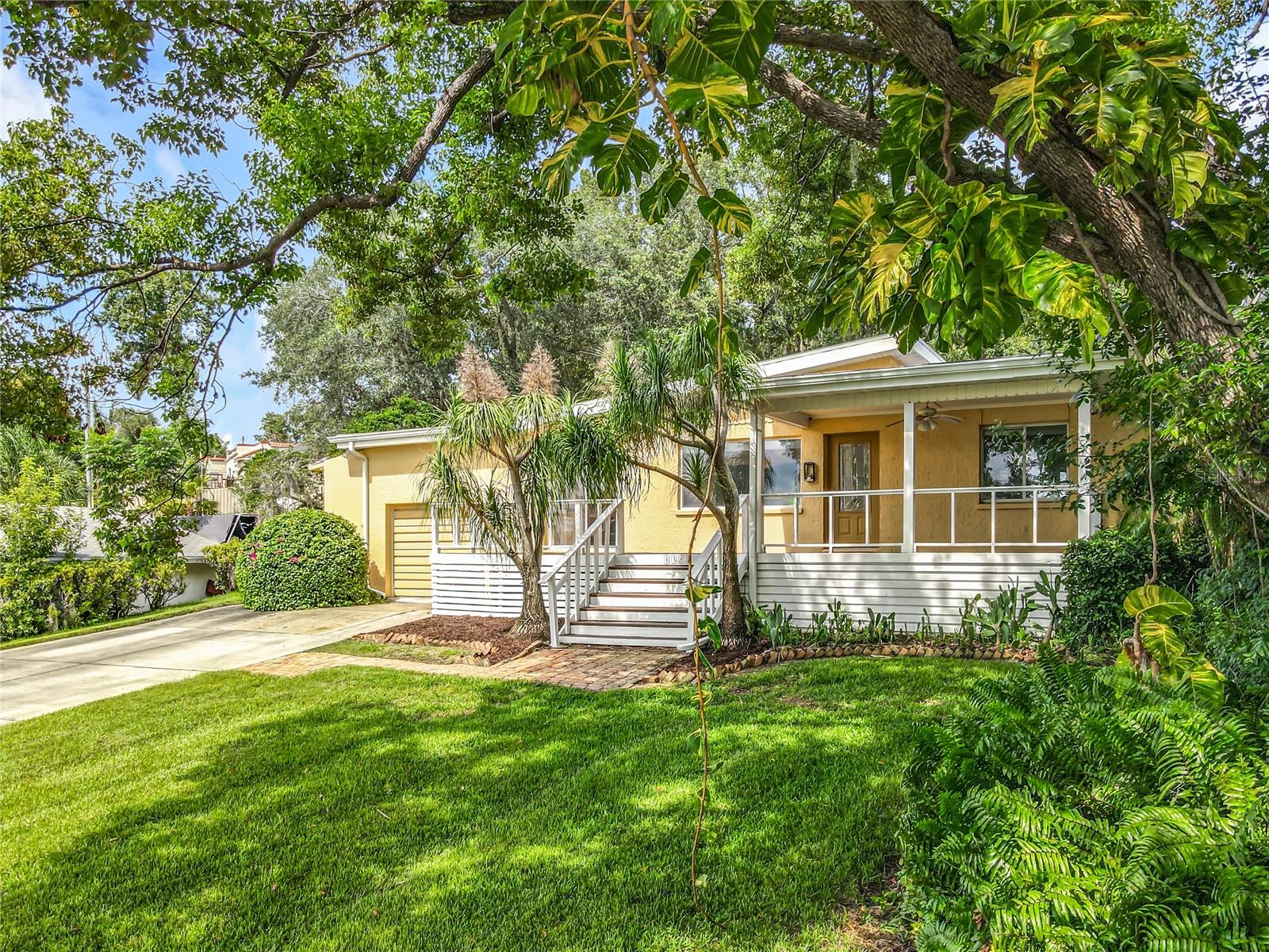 One-of-a-kind bungalow with picturesque lake views, located just moments from Clermont's historic downtown. Take in lake views from almost every room of this home, featuring real hardwood floors, crown molding, and ceiling fans throughout. The open kitchen features a large breakfast bar, stylish backsplash, and lots of cabinetry. Extra-large bedrooms offer generous closet space with built-in shelving. Two roomy baths, indoor laundry, generous closets, and a one-car garage that provides ample storage. Step outside to your own backyard oasis, surrounded by lush landscaping and shaded by mature trees. Enjoy two brick/stone patios perfect for entertaining, plus a workshop/shed for all your yard tools. There's even space for a small trailer or boat. One of the highlights of this charming home is the spacious front porch, a perfect place to enjoy your morning coffee or relax in the evening while watching the sunset. Fantastic location! Fishing, boating, and endless outdoor fun, with plenty of scenic trails for walking or running nearby. Convenient access to major highways makes commuting a breeze, whether you're heading to downtown Orlando, the airports, theme parks, shopping, or restaurants. Travel to Lakeland or Tampa is just as easy. Last but not least, you are just minutes from historic downtown Clermont and Minneola, where you can stroll the charming streets, explore unique shops, enjoy local breweries, and dine at a wide variety of restaurants. Call today to schedule your private tour!