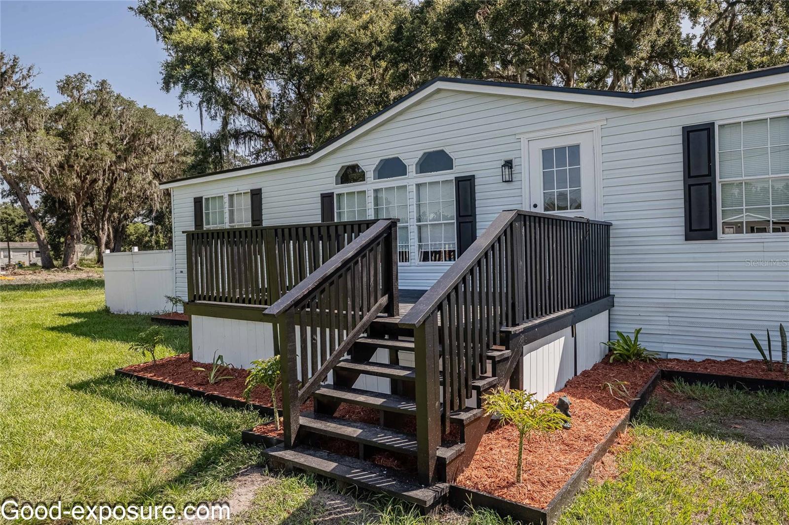 **ALERT**This new listing offers USDA, FHA, VA, Conventional, and Cash! Welcome to 7259 Dove Meadow Trail – A Fully Renovated Retreat on a Spacious, Private Lot! Nestled on a large lot in popular North Lakeland. This beautifully updated home offers the perfect blend of modern style, serene outdoor space, and everyday comfort. Interior Highlights: Step into an open-concept layout with new luxury vinyl plank flooring throughout. The designer kitchen is a chef’s dream – featuring new white cabinets, sleek black hardware, pot filler, quartz countertops, a nice modern backsplash, and new stainless steel appliances, including, range, dishwasher, a built-in microwave and large fridge. Entertain with ease from the eat-in dining area and bar-style countertop overlooking the kitchen/dining room. Relax in a cozy yet sophisticated living room, complete with a stylish ceiling fan and large windows letting in natural light. The primary suite offers peaceful privacy with a spacious walk-in closet and a spa-like bathroom featuring a walk-in tiled shower, double vanity, matte black fixtures, and updated lighting. Exterior & Land is situated on a private, almost 1 acre lot, surrounded by beautiful mature trees, open grassy areas, and partial wooded views — ideal for nature lovers, gardening, or adding future amenities. Enjoy morning coffee or evening sunsets on the charming front porch deck with bold black railings, giving this home modern curb appeal. Ample space for expansion, RV/boat parking, or even a workshop. Located in North Lakeland, this property offers easy commutes via nearbyI-4 to both Tampa and Orlando. Shopping & Groceries Walmart, Publix, Winn-Dixie, and Lakeland Square Mall (approx. 10-15 min drive). Dining Access to restaurants ranging from local diners to national chains along US-98. Schools Zoned for well-rated Polk County public schools; nearby private school options as well. The home has several recreation options such as Lake Gibson, parks, walking trails, and golf courses (e.g. Sandpiper Golf & Country Club). Quiet Community Low traffic area, ideal for peaceful living while still close to town. No HOA, giving you more freedom and flexibility. This move-in-ready home offers the best of both worlds – a peaceful, oversized lot with all the modern upgrades inside. Whether you’re a first-time buyer, downsizing, or looking for land with flexibility, 7259 Dove Meadow Trail is a must-see gem! Schedule your private showing today – this rare find won’t last long!