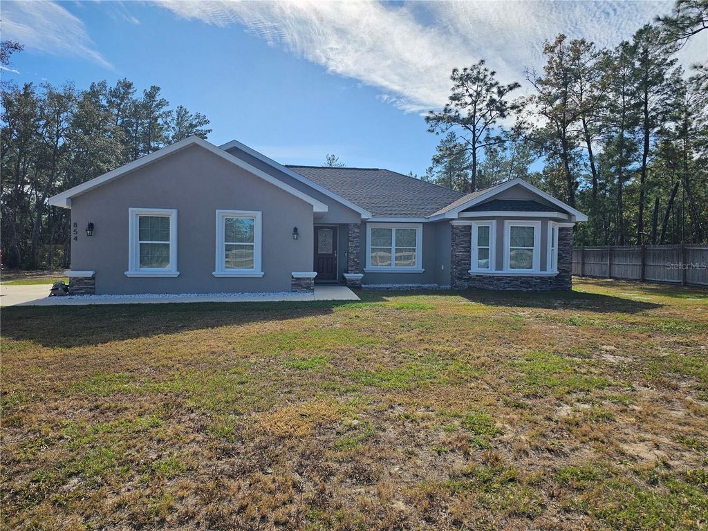 Photo of 854 Fisher Road, Ocklawaha, FL 32179 (MLS # O6325430)