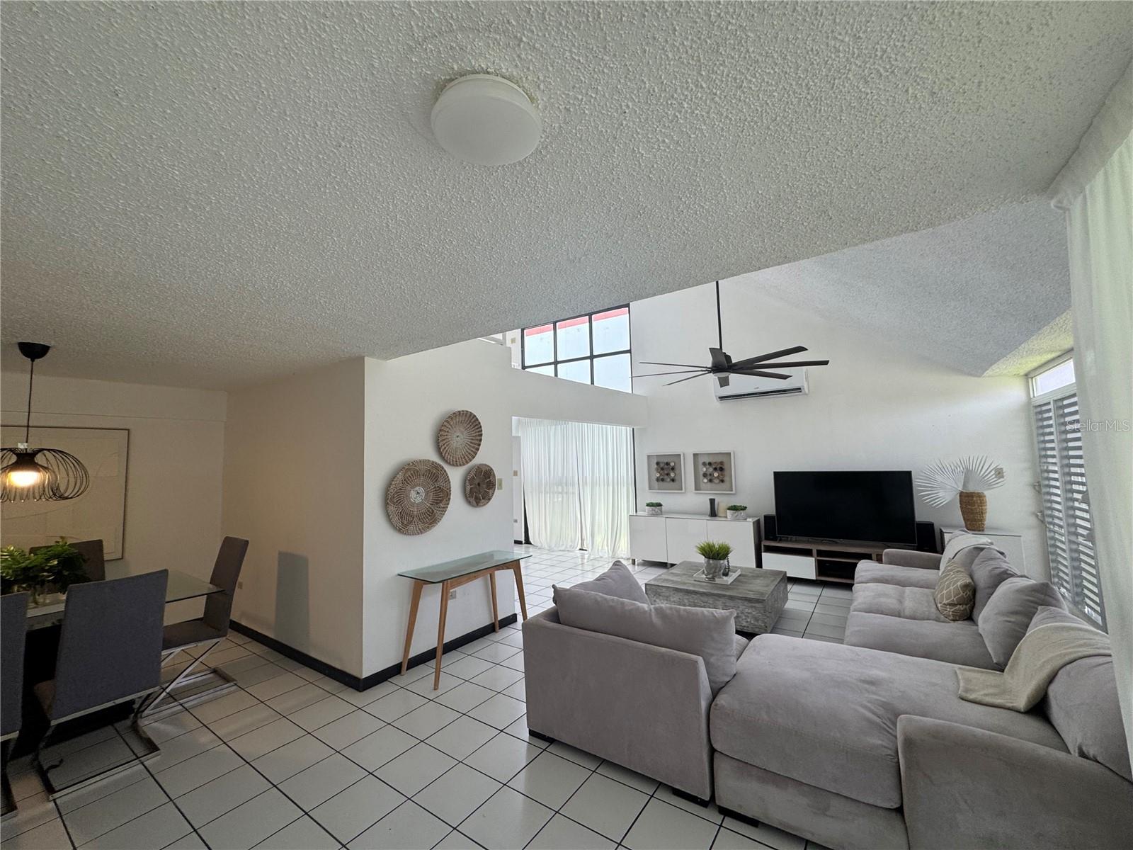 3 bedroom 3 bathroom fully furnished two level home, high ceilings, open mezzanine and bright living area. Located in a gated community with beach access courts and nearby schools and shopping.