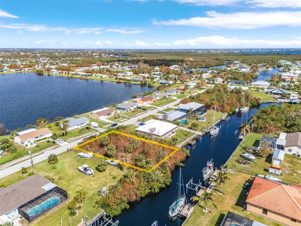 Photo of 18826 Ashcroft Circle, Port Charlotte, FL 33948 (MLS # TB8535549)