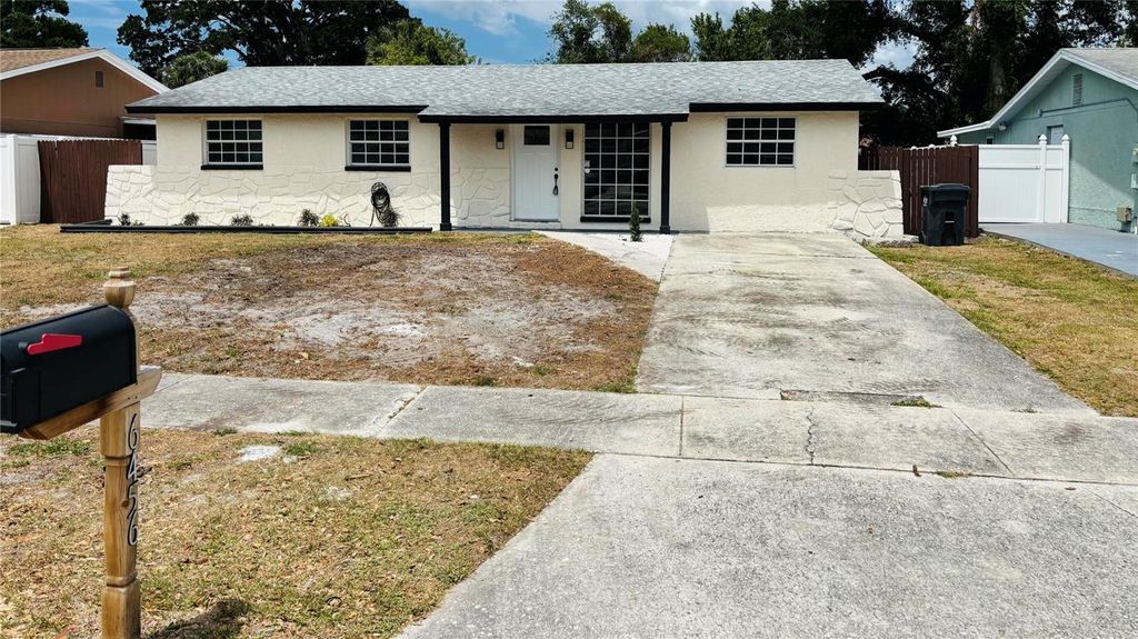 Photo of 6456 Willow Wood Lane, Tampa, FL 33634 (MLS # O6402665)