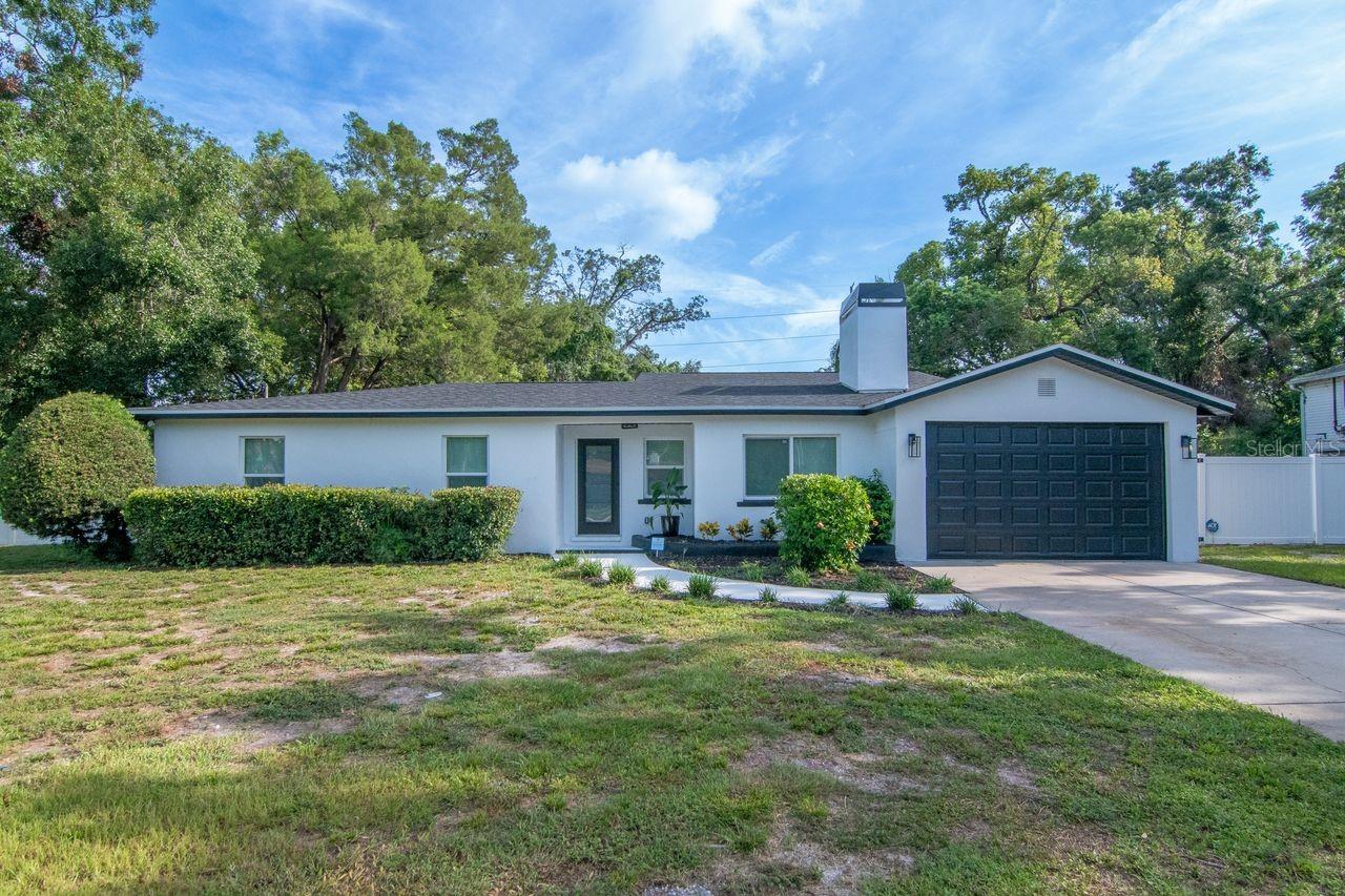 Welcome to Forest Hills! Step into this beautifully remodeled 3-bedroom, 2-bath pool home, perfectly situated on a spacious double corner lot in one of the most sought-after neighborhoods. From the moment you arrive, the long, expansive driveway provides ample parking and sets the tone for this exceptional property.
Inside, you’re greeted by a warm and inviting formal living room featuring a charming brick wood-burning fireplace. The oversized dining room, just off the living area, is bathed in natural light and offers views of the sparkling pool and deck—an ideal setting for gatherings.
The newly updated kitchen is a chef’s delight, complete with granite countertops, stylish waterproof Luxury Vinyl Plank, backsplash, brand-new stainless steel appliances, and abundant cabinetry. A cozy family room with French doors opens directly to the pool and large backyard, creating seamless indoor-outdoor living.
All three bedrooms have been refreshed with new flooring, paint, doors, and ceiling fans. Both bathrooms boast elegant updates, including new tile-floors, designer cabinetry, and stone countertops. The primary suite features dual sinks and a sleek frameless glass-enclosed shower for a spa-like experience.
The backyard is an entertainer’s dream, with a large deck, sparkling pool, and plenty of space for outdoor dining and relaxation. With room for boat or RV parking, the house offers a 30 amp RV hook up, so the possibilities are endless. Additional features include a separate laundry room with storage and counter space, plus a brand-new covered patio perfect for year-round enjoyment. The house has many upgrades for the new owner piece of mind, including impact windows, new plumbing, new roof (updated to Andrew code), new pool equipment, new fence.
Located just minutes from top-rated schools, shopping, dining, sports venues, beaches, and the airport, this home offers both convenience and lifestyle. Move-in ready and waiting for its new owner—schedule your private tour today! This home is under 24 hour video surveillance.