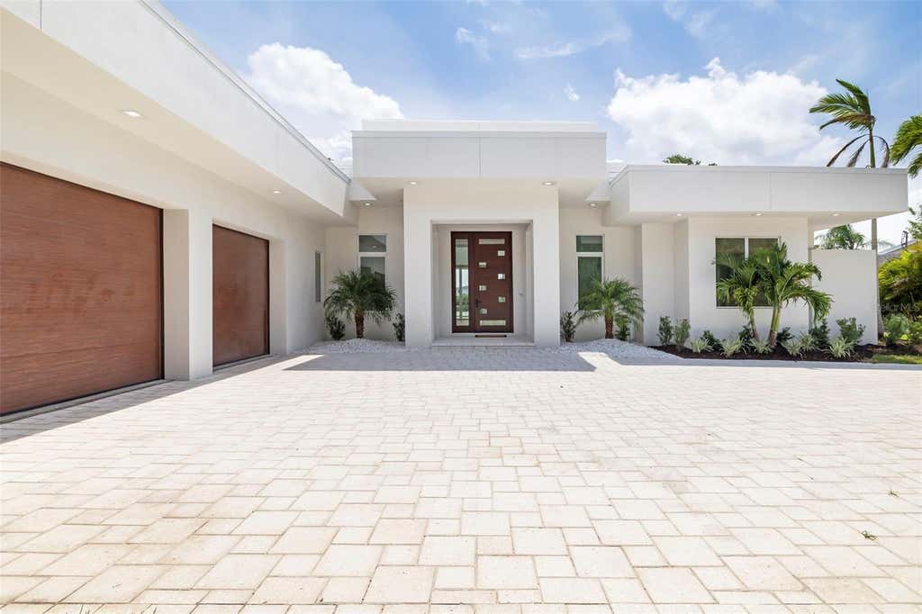 Photo of 4431 Camino Real Real, Sarasota, FL 34231 (MLS # A4626321)