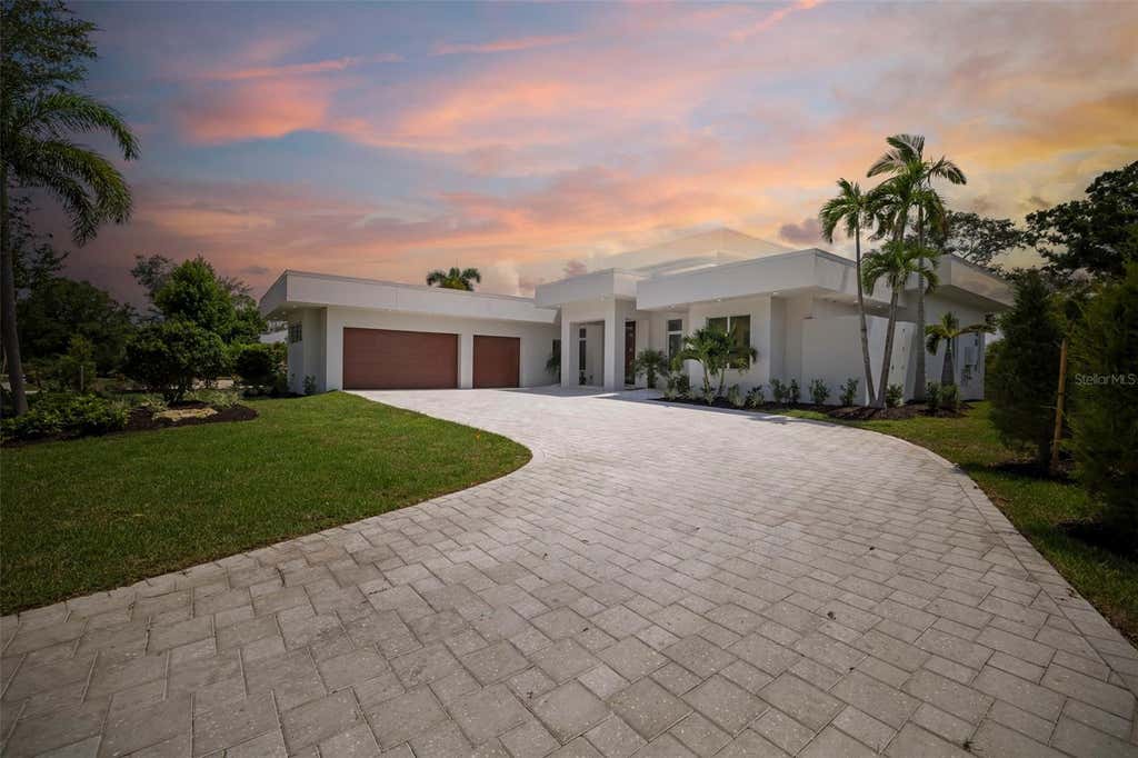 Photo of 4431 Camino Real Real, Sarasota, FL 34231 (MLS # A4626321)