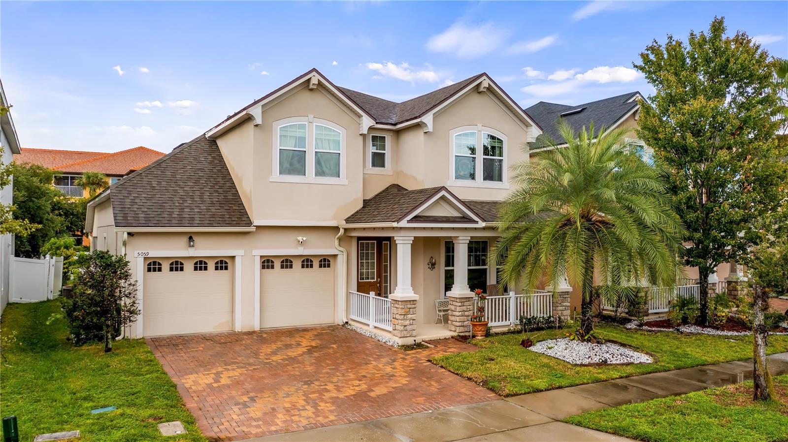 Welcome to this stunning 3-bedroom, 2.5-bath single-family home in the gated community of Millennia Park, one of Orlando's most sought-after neighborhoods. Built in 2015, this move-in ready two-story residence offers 2,440 sq ft of beautifully designed living space with open-concept interiors, high ceilings, and abundant natural light. The spacious chef's kitchen features granite counters, 42? cabinets, and stainless-steel appliances, flowing seamlessly into the dining and living areas, perfect for entertaining. Upstairs, the luxurious primary suite boasts a walk-in closet and spa-style bath. Additional highlights include a 3-car garage, energy-efficient construction, and low-maintenance landscaped yard. Enjoy resort-style community amenities including a sparkling pool, clubhouse, playground, and walking trails, all just minutes from The Mall at Millenia, Universal Orlando, Downtown Orlando, major highways, and top-rated schools. This is Orlando gated living at its finest. Schedule your private showing today!
