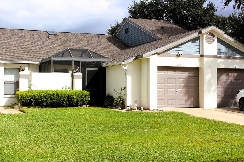 Photo of 149 Lakepointe Circle, Kissimmee, FL 34743 (MLS # O6351459)