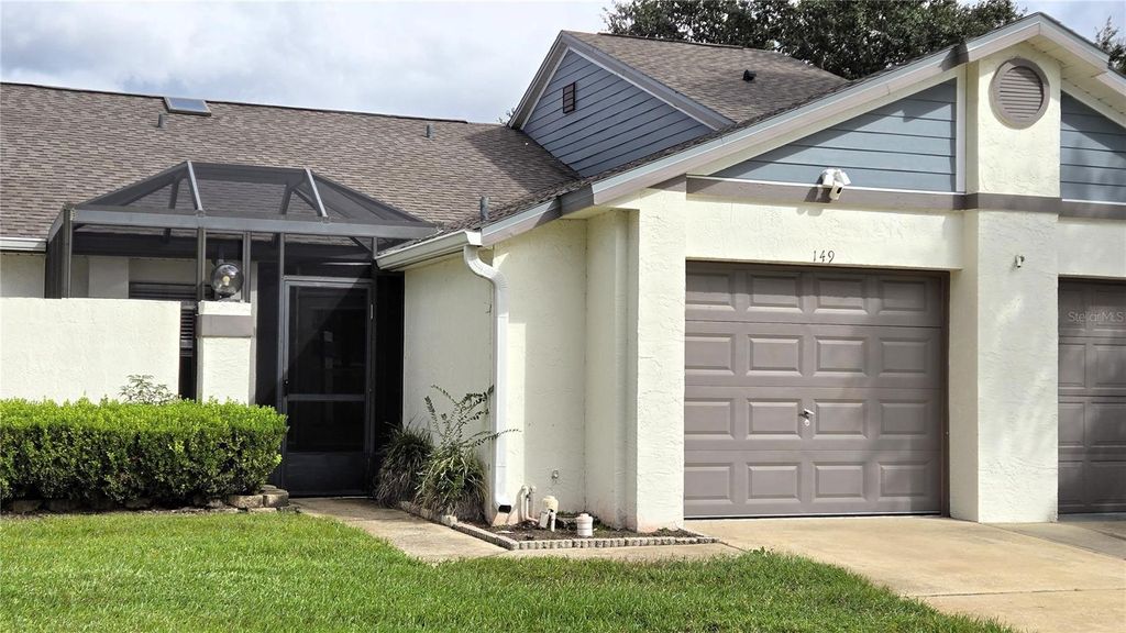 Photo of 149 Lakepointe Circle, Kissimmee, FL 34743 (MLS # O6351459)