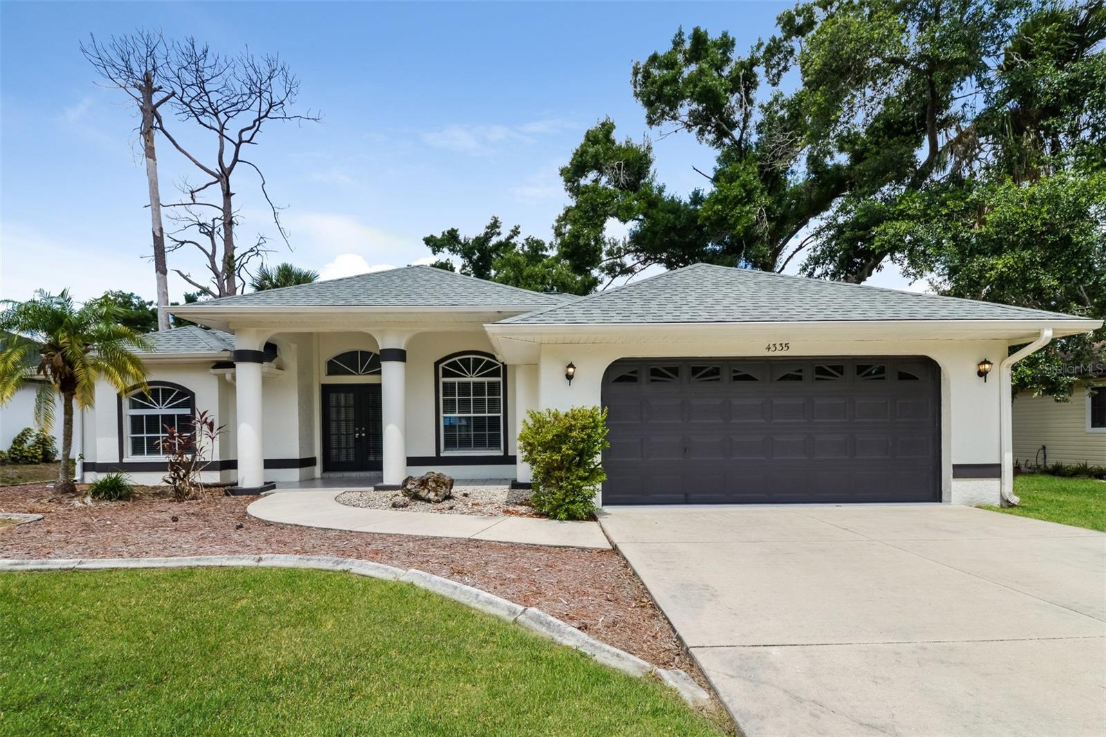 Discover this spacious 3-bedroom, 2-bathroom pet-friendly home boasting 1,876 sq. ft. of comfortable living space. The kitchen is equipped with stainless steel appliances, including a refrigerator, microwave, range oven, and dishwasher. Enjoy the convenience of both an attached and detached garage to accommodate your parking needs. Amenities such as ceiling fans and window coverings are included for added comfort. Don't miss out on the opportunity to make this house your next home