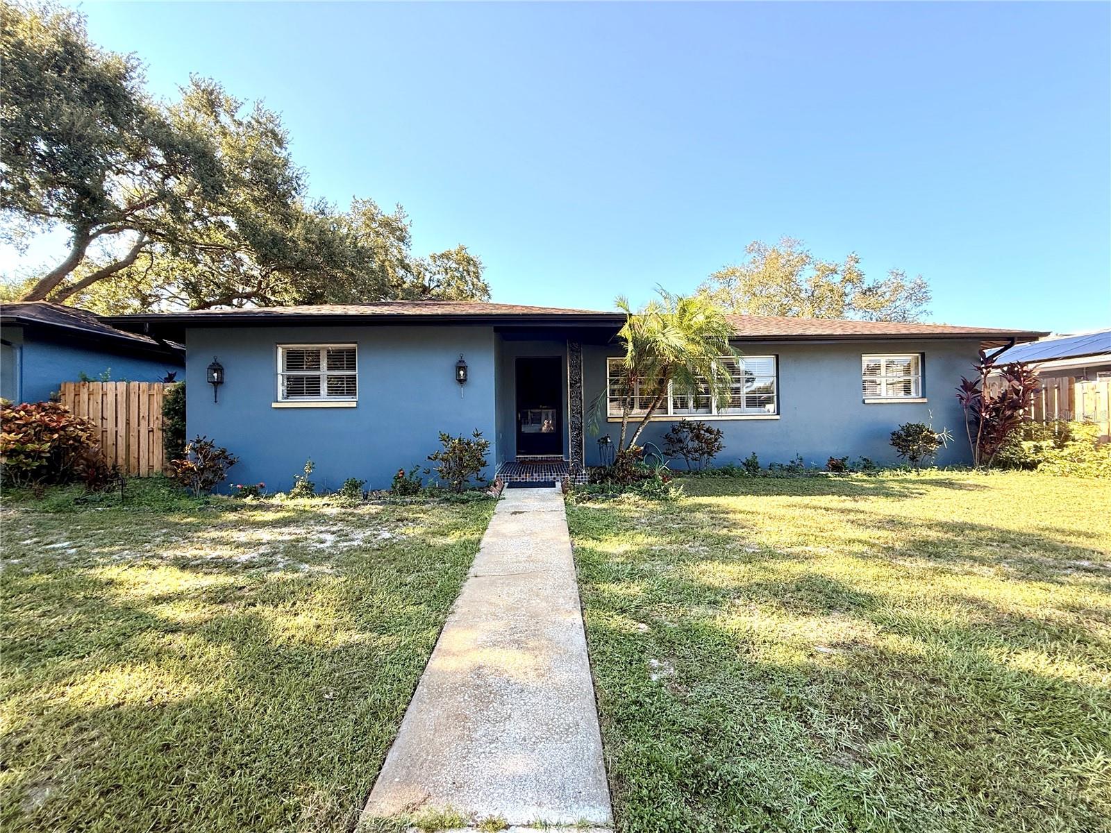 WELCOME TO SUNSHINE ESTATES IN THE HEART OF PALM HARBOR! THIS BEAUTIFUL PROPERTY OFFERS 4 BEDROOMS, 3.5 BATHROOMS, SPACIOUS LIVING AREA WITH AN OPEN LAYOUT, WELL-APPOINTED KITCHEN AND DINIG SPACES THE GARAGE HAS BEEN CONVERTED INTO A LIVING SPACE WHICH INCLUDES 2 BEDROOMS, OPEN KITCHEN, 1.5 BATHROOMS, AND LIVING AREA FOR A TOTAL OF 731 SQFT, THAT WAS ADDED TO THE LIVING SPACE OF THE PROPERTY, FULLY PERMITTED WITH ALL REQUIRED DOCUMENTATION AND ENGINEERING REPORT ON FILE WITH PINELLAS COUNTY, THIS UNIQUE PROPERTY PRESENTS A FANTASTIC OPPORTUNITY - PERFECT FOR MULTI-GENERATIONAL LIVING, AN IN-LAW SUITE, OR GENERATING RENTAL INCOME BY OCCUPYING ONE UNIT AND LEASING THE OTHER. SITUATED IN A QUIET NEIGHBORHOOD, AND A MINUTES AWAY FROM TOP-RATED SCHOOLS, SHOPPING, AND DINING, CLOSE TO AWARD-WINNIG GULF BEACHES.