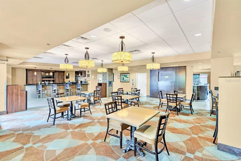 Photo of 7601 Canada Avenue #417, Orlando, FL 32819 (MLS # O6446535)