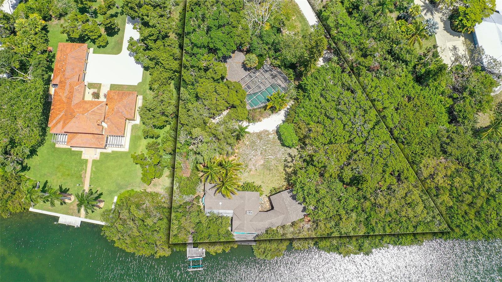 Under contract-accepting backup offers. For information only. See MLS # A4569257 This spectacular "Old Florida" waterfront lot with 252 feet on Bishop's Bayou has two structures in disrepair and is being sold for lot value. Being sold As-Is, the seller will not make any repairs. The structure with the pool could be made livable for a temporary residence with lots of TLC. Please make offers on FloridaRealtor/FloridaBar 6 As-Is contract form and the attachments loaded in MLS along with proof of funds or pre-approval. Dock lift is not warranted. Seller was exempt from paying property tax.