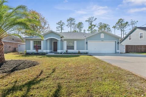 Photo of 65 Kalamazoo Trail, Palm Coast, FL 32164 (MLS # FC314170)