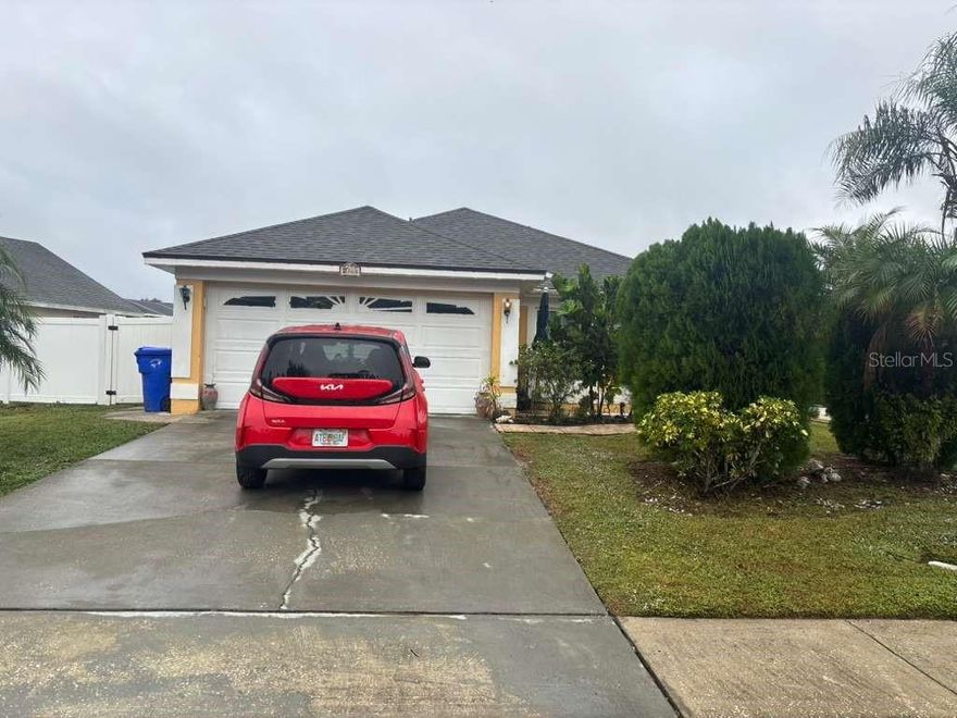 <LAST PRICE REDUCTION><HIGHEST & BEST BY 01/30/2025> This is an incredible opportunity in one of Kissimmee’s most desirable neighborhoods- perfect as a starter home, a fix and flip, a long-term hold, or a cash-flowing investment. From the moment you arrive, the home delivers eye-catching curb appeal with a bold, sunlit exterior, a long and wide driveway leading into a true 2-car garage, and lush tropical landscaping that frames the property like a private Florida oasis. Mature palms, manicured hedges, and a charming tiled walkway set the tone, while the spacious backyard and screened patio offer endless potential for outdoor living, upgrades, or future appreciation. A standout 3 bedroom, 2 bathroom home, on a corner lot, with charm, character, and undeniable upside.

Step inside to a warm and inviting open-concept layout with vaulted ceilings that instantly make the home feel bright, airy, and comfortable. The living and dining areas flow seamlessly, creating a perfect setting for family gatherings and entertaining. Decorative niches, accent shelving, and abundant natural light add personality throughout. The kitchen features a functional layout with ample cabinetry, pantry storage, and generous counter space- ideal for everyday cooking or designing a full modern renovation to elevate the space. Multiple windows bring in great natural light, and the breakfast nook provides a cozy spot for morning coffee or casual meals.

The bedrooms offer comfort and versatility, with the primary suite featuring warm natural light and excellent storage for a full furniture setup. The secondary bedrooms are equally flexible- perfect for guests, kids, or a dedicated office. Both bathrooms are well-appointed with updated vanities and great lighting, providing a clean foundation for simple cosmetic enhancements or a full spa-inspired upgrade.

The oversized garage is a major highlight, currently set up as a massive multi-purpose area. One side includes a dedicated laundry zone with washer, dryer, and shelving, while the remaining open floor space is ideal for a workshop, home gym, media room, storage, or even a future conversion. The possibilities here are endless. Step outside into your private backyard retreat- fully fenced, wrapped in tropical greenery, and offering total privacy. The expansive screened-in lanai surrounds a stunning geometric in-ground pool, ready for a fresh refill and your personal finishing touches. This space has huge potential to become a resort-style paradise, perfect for sunny Florida pool days, evening gatherings, or a peaceful garden sanctuary beneath the fruiting tree.

Major upgrades provide peace of mind: the roof and A/C are both only 2 years old, the home is equipped with hurricane-impact windows, and the electrical and plumbing are in excellent condition. The HOA is extremely affordable, minimal, and non-restrictive- offering the best of community living without the burden of heavy rules.

A fantastic opportunity for homeowners and investors alike- don’t miss the chance to secure a well-maintained property with strong upside in one of Kissimmee’s most sought-after areas.