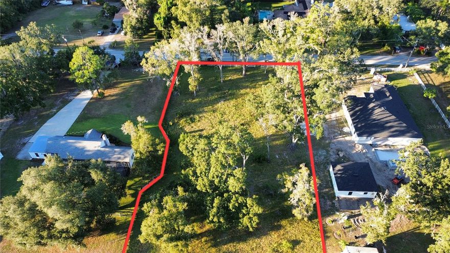 Don't miss this opportunity to build your dream home in Lutz on 1.3 acres! This lot is zoned ASC-1 which allows for agriculture animals (up to 3 hooved animals) with NO HOA restrictions! Build your home, shed, bring your boat, RV, and more. The potential is endless! Centrally located to all conveniences and near Nebraska Ave which has restaurants, shops, and grocery stores. It has easy access to 275, I-75, Tampa Premium Outlets, Wiregrass Shops, Hospitals, USF, Tampa International Airport, and beach. Lot has 3 sides fenced and access to asphalt Whitaker Road. There is a water well on the property and easy connection to electricity. The lot is 143 feet deep giving you space to build a circular driveway or plan the placement of your home with extra space. Most of the lot is already cleared and the trees on site are mature and beautiful. No rear neighbors! Flood Zone X (NO FLOOD INSURANCE REQUIRED). Survey is available and easy to show! On Hanna Road and Whitaker (Near Livingston Rd).