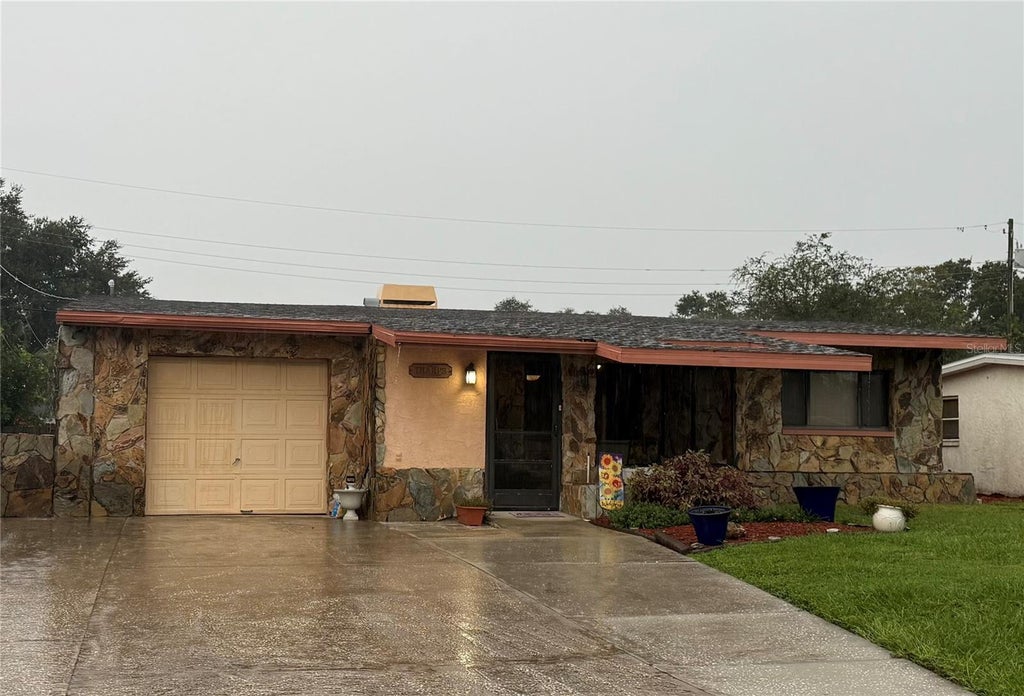 Photo of 10735 110th Ln, Largo, FL 33778 (MLS # TB8556155)
