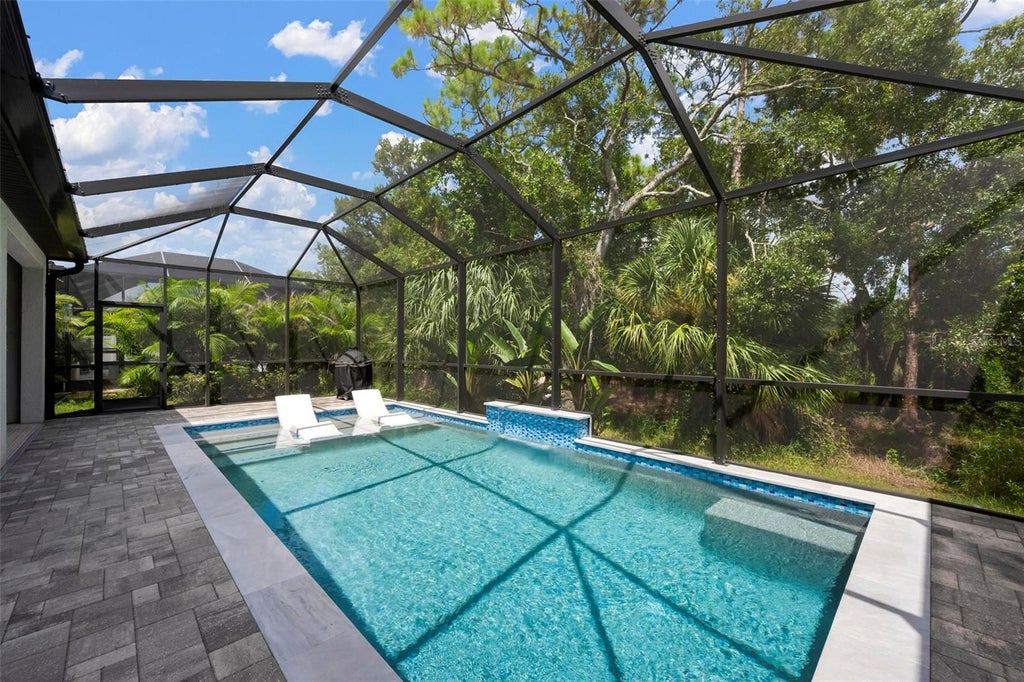 Photo of 3598 Secret Stroll Drive, Sarasota, FL 34240 (MLS # A4702904)