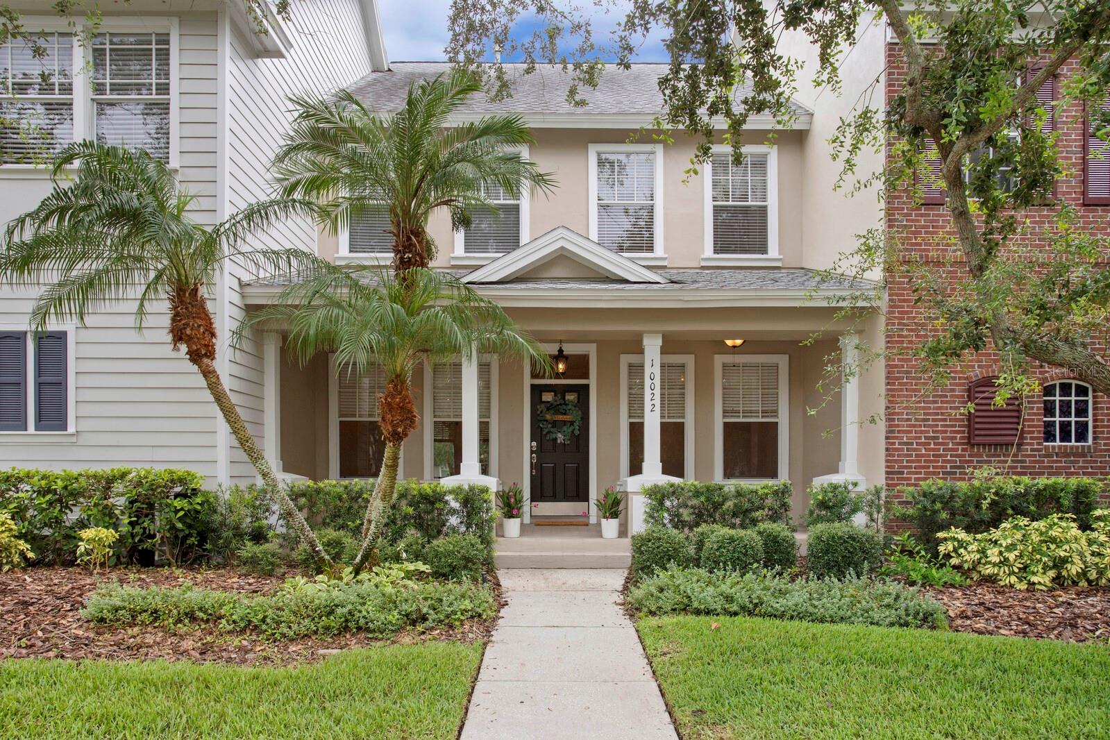 Welcome to West Park Village in Westchase—one of the most sought-after neighborhoods in Tampa! This bright and beautifully maintained 3-bedroom, 2.5-bathroom townhome is perfectly situated overlooking a green park and just steps from the community pool and tennis courts. You’ll love the unbeatable convenience, with tunnels under Linebaugh Ave providing easy access to Baybridge Park and nearby the vibrant restaurants, shops, and cafes of West Park Village. From the moment you arrive, you’ll be drawn to the spacious covered front porch—perfect for relaxing in rocking chairs and connecting with neighbors. Inside, the layout offers versatility and charm. To the left is the formal dining room, while to the right is a flexible living room/den that could easily serve as a home office, gym, or extra lounge space. A half bath with a granite countertop sits just off this area. The heart of the home is the cozy, open-concept kitchen and family room. Enjoy plenty of counter space, sleek granite countertops, a matching backsplash, a brand-new refrigerator, and a quiet KitchenAid dishwasher. Washed wood cabinets and coastal design touches add to the relaxed, stylish feel. A large family room and eat-in dinette area complete the space—ideal for hosting and everyday living. Step outside to your private, covered back lanai and fully fenced backyard—your personal retreat. The brick paver walkway leads to a rear-facing 2-car garage with alley access and additional overhead storage. Upstairs, the expansive master suite features a luxurious ensuite bath with a large soaking tub, separate shower, dual vanities, and a spacious walk-in closet. Hurricane shutters and double-paned windows offer peace of mind in the kitchen and primary bedroom. Roof (2019). Water Heater (2018). Exterior Paint (2021). Carpet (2021). AC (2011). Enjoy Maintenance-Free Living with Full Access to Westchase Amenities: 2 resort-style pools + toddler pool, 10 lighted tennis courts, Splash park, playgrounds, and basketball courts, Outdoor fitness equipment, ping pong tables, and picnic pavilions, Scenic nature trails and pedestrian tunnels for safe, easy access across Linebaugh. All of this is just a short walk from local eateries, coffee shops, and boutiques. Plus, you're minutes from Citrus Park Mall, Costco, International Plaza, Tampa International Airport, and downtown Tampa. WELCOME HOME!!