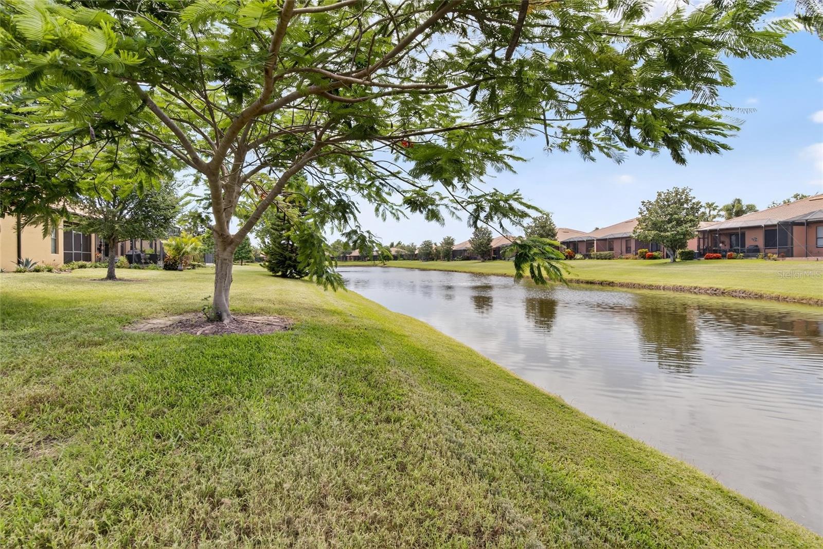 LOOK NO FURTHER!!.. LOCATION... LOCATION... LOCATION... PARADISE AWAITS!! METICULOUSLY MAINTAINED 2 bedrooms, with a den/study which could be easily utilized as a 3rd bedroom. 2 bath 2 car garage villa located in the maintenance free living of Southshore Falls. This beautiful villa is move in ready with a gorgeous WATER view. As you step outside into the SCREENED LANAI enjoy the peace and quiet of this tranquil community. Perhaps enjoy a cup of coffee or an adult beverage with a good book or watch the ever-changing views of nature on the pond. Landscaping maintained by HOA. This pristine condition home boasts an open kitchen with 42" cabinets, granite countertops, breakfast bar and room for bistro seating and many upgrades Split floorplan works great for when you have guests. COME CHECK THE STATE OF THE ART RESORT STYLE AMENITIES... YOU WILL BE WANTING TO PROLONG YOUR VISIT WITH A DIP IN THE BEAUTIFUL POOL OR RELAX AT THE CLUBHOUSE.You will never be bored in this gated community that offers lots of social activities and clubs. 3 pools, including LAGOON POOL, RESISTANCE POOL, AND EAGLES NEST POOL are all heated, hot tub, clubhouse, with state of the art fitness center! Casual coffee cafe, hobby/craft room, Ballroom, library/card room, billiards, putting green, shuffleboard and bocce ball courts!! Walking trails, tennis and pickleball courts, fitness, and a community that allows pets. NO CDD, don’t miss your opportunity and make this your home today!! Easy to view. Chat with the neighbors and learn firsthand what this community has to offer... plan on relaxing at the pool or enjoying some exercise at the pickleball courts or gym, or perhaps playing cards, or Bingo or crafts.. so much to do.. so stop by and hear all about the fun your new friends and neighbors are experiencing. YOU WILL NOT BE DISAPPOINTED.