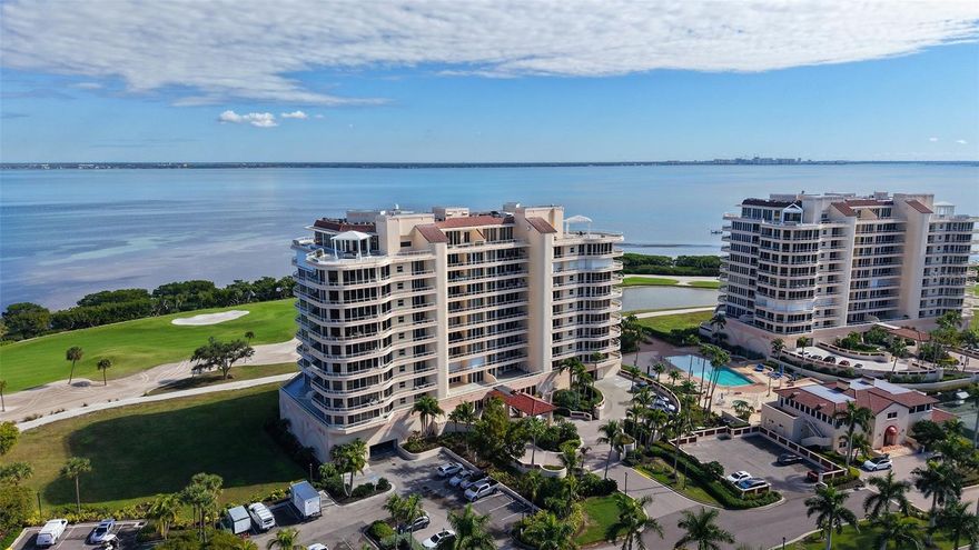 Positioned high on the south side and 9th floor of Building One, this turnkey-furnished residence at Grand Bay offers expansive Sarasota Bay, golf course and downtown views, refined interiors, and effortless resort living on Longboat Key. Spanning nearly 2,300 square feet, the open layout is framed by walls of glass and a wraparound terrace with access from nearly every room—creating a seamless connection between indoor spaces and the ever-changing water views below.
Recently refreshed with new contemporary furnishings included, the residence is truly move-in ready. The spacious great room flows naturally into the dining area and kitchen, creating an inviting setting for entertaining or relaxed daily living. Floor-to-ceiling glass sliders bring in abundant natural light while showcasing views of the bay, marina, and downtown Sarasota.
The primary suite is a private retreat with terrace access, generous closet space, and a well-appointed en-suite bath. Two additional bedrooms provide flexibility for guests, office use, or extended stays, each positioned to enjoy natural light and views. Electric storm shutters throughout offer convenience and peace of mind.
This residence includes two deeded parking spaces and an additional storage unit, a valuable combination rarely available at this elevation.
Grand Bay is one of Longboat Key’s most sought-after gated communities, offering residents a full suite of resort-style amenities including two heated swimming pools with sundecks, Har-Tru tennis courts, a modern fitness center, clubhouse, and an active social calendar. On-site management and 24-hour security ensure a well-maintained, secure environment. As an exclusive benefit, owners enjoy deeded access to the private Bay Isles Beach Club, where Gulf-front pavilions, grilling areas, and pristine shoreline create the perfect setting for beach days and sunset gatherings.
Located behind the gates of Bay Isles, Grand Bay balances privacy with proximity. Just minutes away are the boutiques and restaurants of St. Armands Circle, the cultural offerings of downtown Sarasota, championship golf and marina access at Harbourside, and the beaches of Lido and Siesta Key. From boating and tennis to theater, dining, and art, this residence places the best of Sarasota living within easy reach.
A rare opportunity to enjoy turnkey bayfront living in one of Longboat Key’s premier communities.
