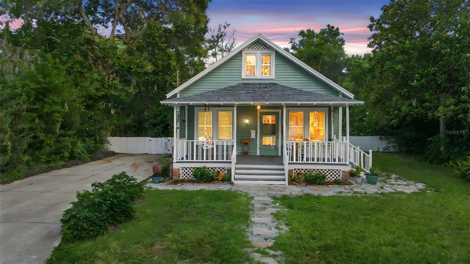 DELAND:ROOF 2023| NEW TANKLESS WATER HEATER | NEW WINDOWS | NEW APPLIANCES | NEW TOILET | NEW DRIVEWAY: Welcome to this charming 3 bedroom, 1.5 bathroom Craftsman home located on one of DeLand’s most desirable streets. From the moment you arrive, the inviting front porch sets the tone with timeless curb appeal—perfect for relaxing with your morning coffee or greeting neighbors. Step inside to discover original wood floors, abundant NEW windows that flood the living room with natural light, amazing crown molding and a cozy atmosphere that feels like home. The living room boasts many windows to allow for private yard views. The spacious dining room is ideal for gatherings, featuring built-in cabinetry to store your treasures and showcase your favorite collectibles. The galley kitchen is both functional and stylish, boasting NEW stainless steel appliances, glass-front cabinets, NEW reverse osmosis Filer and NEW disposal. The primary bedroom offers generous space plus a unique 8x10 bonus area—perfect for a custom closet, home office, or cozy reading nook. The second bedroom is ideal for guests or a dedicated workspace. A charming winding staircase leads to the third bedroom—a spacious loft-style retreat with a half bath and plenty of room to spread out. Adorable inside laundry with Tile floors and NEW cabinets and the NEW washer and dryer stay! You’ll love the the stunning fenced backyard oasis, complete with a huge screened porch with wood beam ceilings, a patio for grilling and entertaining, and a 8x12 shed for extra storage. The .27 acre yard features bamboo, a Bougainvillea bush, magnolia bush, gardenia bush and a small garden with berries and veggies so bring your green thumb! The home also features a NEW driveway so there is plenty of room to park several cars. Located just minutes from shopping, dining, and award-winning Downtown DeLand, this home blends classic charm with modern comfort in a location that’s hard to beat. Don’t miss this opportunity to own a piece of DeLand's history with space to live, work, and play! Don't wait! Make your appointment today to see all this home and property have to offer you!