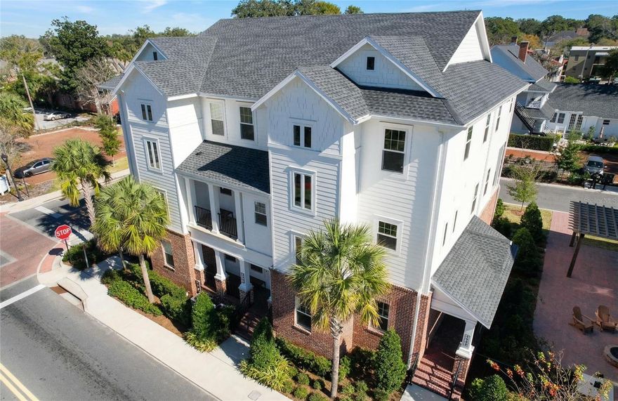 Experience refined downtown living in this beautifully designed three-story townhouse in the heart of Ocala. Offering 3 spacious bedrooms, 3 full bathrooms, and 1 half bath, every bedroom features its own private en suite—perfect for comfort and privacy. The first floor includes a versatile bedroom that makes an ideal home office, guest suite, or flex space. Upstairs on the second level, enjoy an open-concept layout with a bright and inviting living, dining, and kitchen area that flows seamlessly onto a private balcony—perfect for morning coffee or evening relaxation. This home is thoughtfully designed with convenience in mind, featuring two laundry closets—one on the ground floor and another on the top level. The third floor hosts a generous primary suite complete with a massive walk-in closet, creating a true retreat.
 Located in a gated community with a cozy firepit gathering area, this home offers both security and a sense of community. Situated directly across from City Hall and just steps from downtown Ocala’s shops, dining, and entertainment, you’ll enjoy the best of urban living right outside your door.
