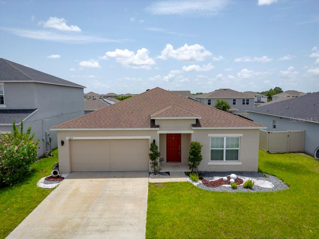 Welcome to this beautifully maintained 3-bedroom, 2-bathroom single-family home in the heart of Davenport, Florida! This property features ceramic tile flooring throughout, offering both style and easy maintenance. Enjoy an open floor plan perfect for entertaining, along with a screened-in lanai ideal for relaxing evenings.
The home is equipped with solar panels that will be paid off at closing, offering energy efficiency and long-term savings. It also includes a reverse osmosis water filtration system, adding extra value and convenience.
Located just minutes from movie theaters, popular shopping centers, restaurants, and more, this home combines comfort, sustainability, and unbeatable location. Don’t miss the opportunity to make it yours—schedule your private showing today!