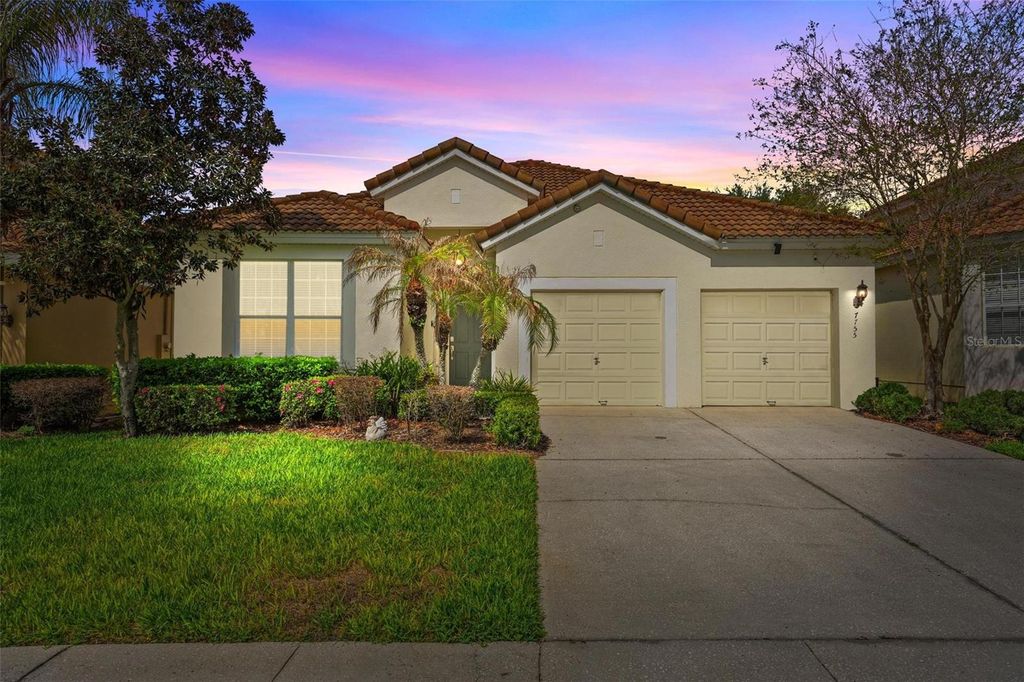 Photo of 7755 Grassendale Street, Kissimmee, FL 34747 (MLS # O6396993)