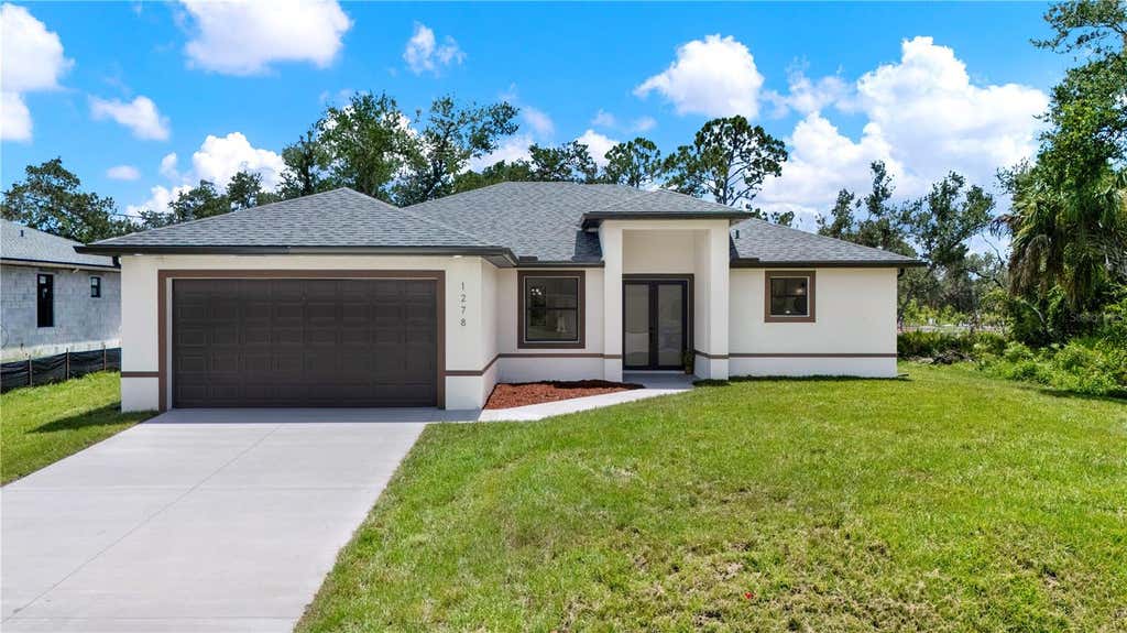Photo of 1278 Miliken Terrace, Port Charlotte, FL 33953 (MLS # A4701120)