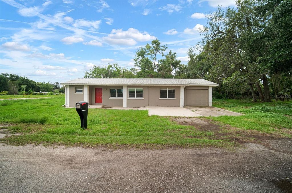 Photo of 1217 W Terrace Drive, Plant City, FL 33563 (MLS # TB8393926)