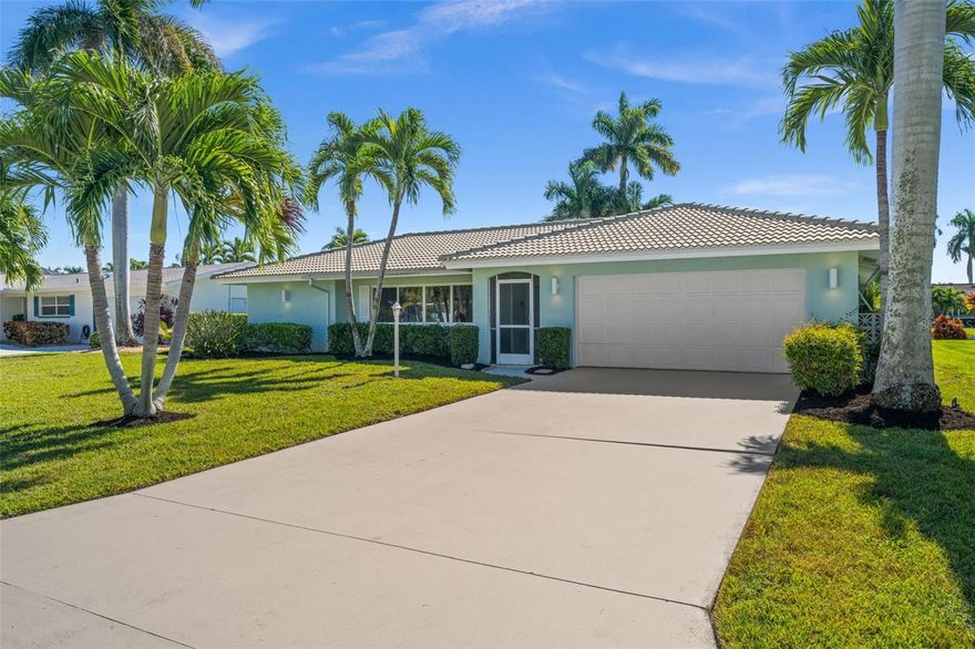 Welcome to this beautifully remodeled Direct Gulf-access home located on a quiet cul-de-sac in SW Cape Coral. Offering direct sailboat access with no bridges and an 8,000 lb boat lift, this property is ideal for those who want quick and easy access to open water, waterfront dining, and the Gulf. The southern exposure provides sun on the pool all day, while mature palm trees and lush landscaping create a tropical backdrop. Inside, the home features over 2,500 square feet of updated living space with a spacious open layout. The gorgeous kitchen is the heart of the home, complete with a massive cooking island, granite countertops, stainless steel appliances, soft-close shaker cabinets, a breakfast bar, and a pass-through window to the lanai. A butler’s pantry and coffee bar offer even more storage and prep space. The formal dining room and multiple living areas make the home comfortable for both everyday living and entertaining. The primary suite includes a walk-in closet and a newly remodeled ensuite bath with contemporary tile finishes. One of the guest bedrooms opens directly to the lanai and also features a large attached sitting room with a stunning brick fireplace and hearth. Another room functions perfectly as an office, complete with its own AC unit, closet, and sliding door to the lanai, offering the flexibility to be used as a fourth bedroom if desired. The enclosed lanai is bright and welcoming with skylights and wide sliding doors that open to the covered outdoor area and heated pool. The pool deck provides plenty of space to lounge, dine, or enjoy the water views. Additional features include a fully remodeled guest bathroom, an interior laundry room, hurricane impact windows, tile flooring throughout, a tile roof, and a two-car garage. Lots of new upgrades in last 2 years: Kitchen Appliances, Impact Windows, Electrical Box, Hot Water Heater, Pool Heater, Variable Speed Pool Pump. Medeco Door Locks and a personal lock box have been installed for additional security. Located near Tarpon Point, Cape Harbour, and Downtown Cape Coral, this home combines a fantastic boating location with a peaceful setting and modern interior upgrades. Move-in ready and designed for the Florida lifestyle!