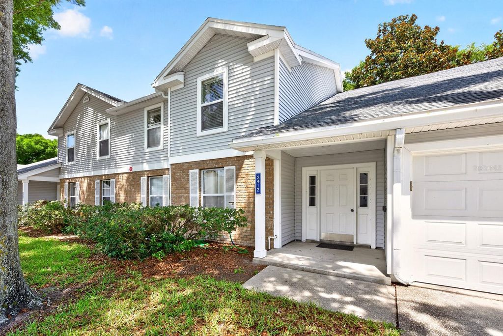 Photo of 2412 Tack Room Lane #6, Orlando, FL 32812 (MLS # O6410448)